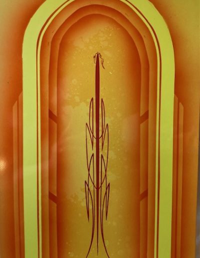 Airbrushed low rider panel in yellow and orange- pinstriping by Jeff Styles